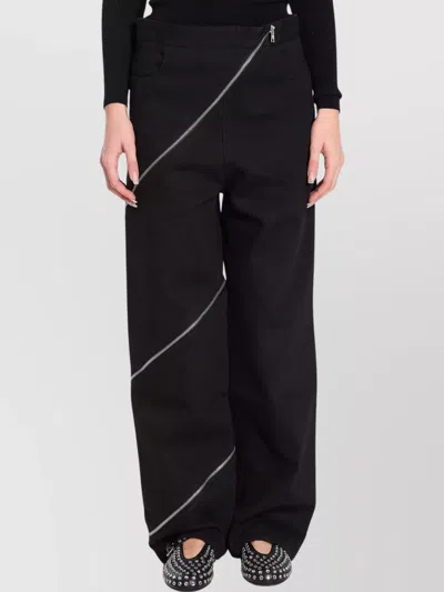 ALAÏA WIDE LEG ZIP DETAIL DENIM TROUSERS