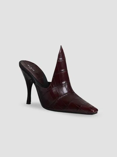 Alaïa Women's 100mm Crocodile Embossed Mules In Marron Fonce