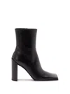 Alaïa Square Calfskin Leather Ankle Boots In Black
