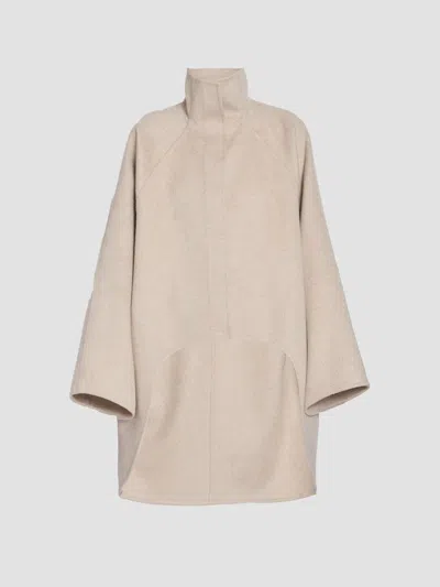 Alaïa Women's Asymmetric Double-faced Cashmere Coat In Beige