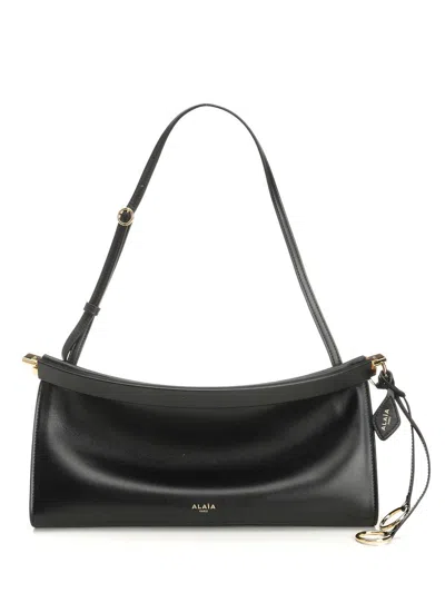 Alaïa Women "le Click East West" Bag In Black