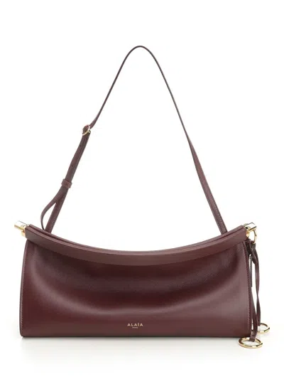 Alaïa Women "le Click East West" Bag In Burgundy