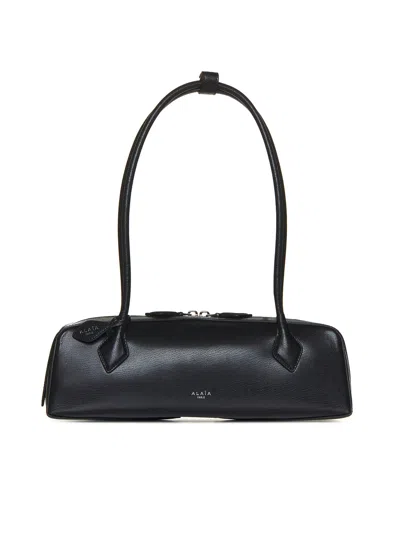 ALAÏA ALAÏA WOMEN "LE TECKEL" MEDIUM BAG IN BLACK LEATHER