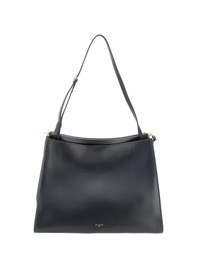Alaïa Women Leather Shoulder Bag In Black