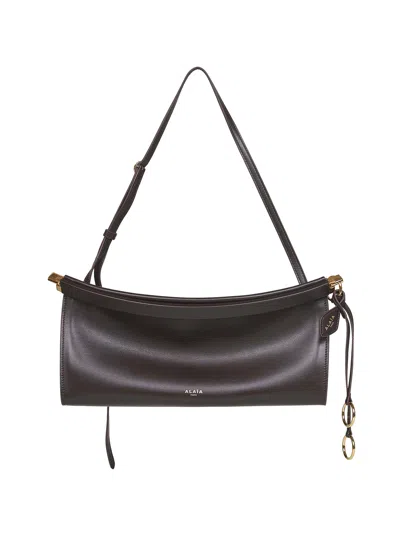 ALAÏA ALAÏA WOMEN MARRON FONCE LE CLICK EAST WEST MEDIUM SHOULDER BAG<BR/>