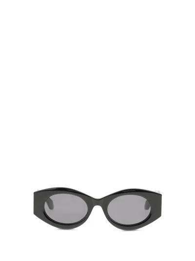 Alaïa Women Oval Sunglasses In Black