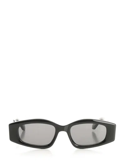 Alaïa Women Oval Sunglasses In Black