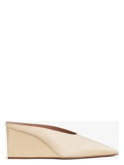 Alaïa Alaia Sand Bucket Wedge Mules In Neutral