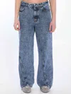 Alaïa Twisted Stonewashed Denim Jeans In Blue