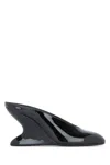 Alaïa Women Mules With Curved Wedges