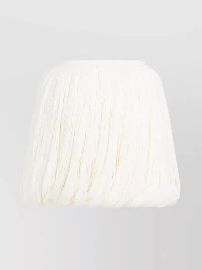 ALAÏA WOOL BLEND FRINGED SKIRT