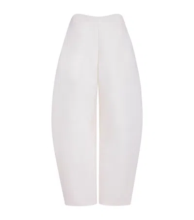Alaïa Wool Crepe Round Trousers In White