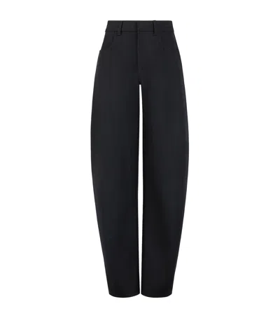 Alaïa Wool Denim Round Trousers In Blue