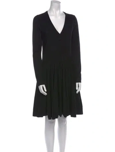 Pre-owned Alaïa Wool Knee-length Dress In Black