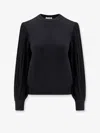 Alaïa Slit Fringe Sleeve Wool Crewneck Sweater