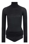 Alaïa Wool Turtleneck Bodysuit In Black