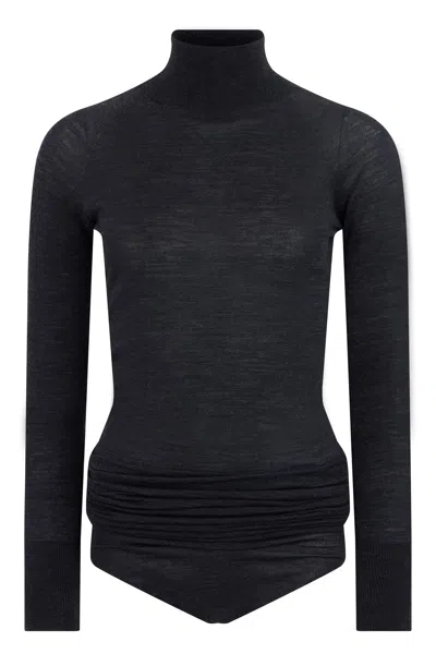 Alaïa Wool Turtleneck Bodysuit In Black