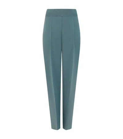 Alaïa Wool-blend Tapered Trousers In Blue