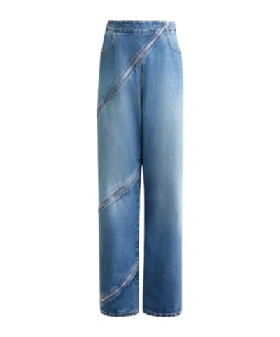 ALAÏA ZIPPERED JEANS