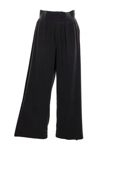 Alainpaul Trousers In Black