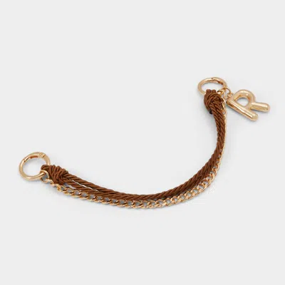 Aldo Alphabet In Gold In Brown