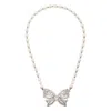 Alessandra Rich Bow Pendant With Pearl Beads And Rhinestone Embellishments In Silver