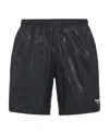 Alexander Mcqueen Solid Color Swim Shorts With Graffiti Print In Black