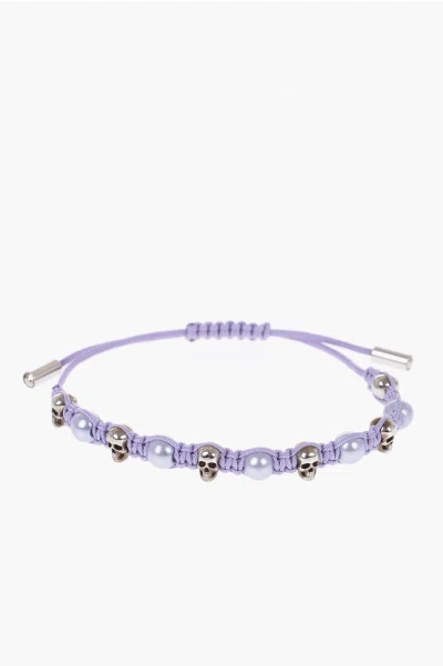 Alexander Mcqueen Adjustable Friendship Bracelet With Golden Skulls And Pearls In Purple