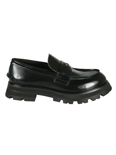 Alexander Mcqueen Seal Logo Leather Penny Loafers In Black