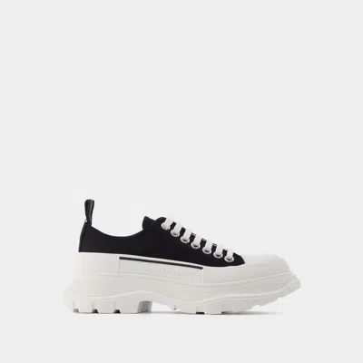 ALEXANDER MCQUEEN BASKETS TREAD SLICK EN TOILE NOIRE & BLANCHE