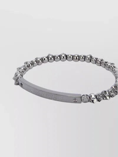 Alexander Mcqueen Beaded Bracelet Featuring Skull Detailing In Metallic