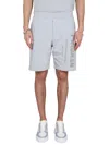 Alexander Mcqueen Men Bermuda Shorts With Graffiti Logo Print In Grey