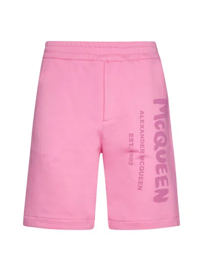 ALEXANDER MCQUEEN BERMUDA SHORTS WITH GRAFFITI LOGO PRINT