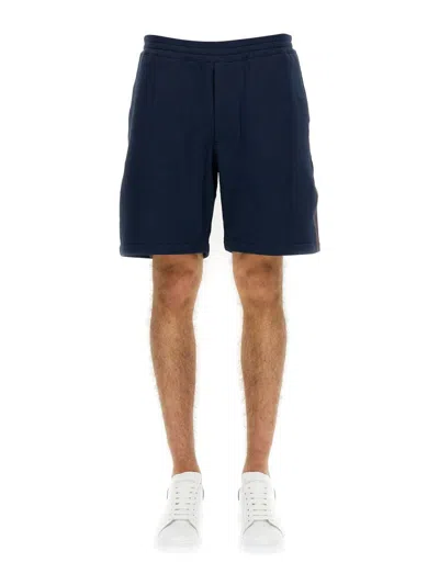 ALEXANDER MCQUEEN ALEXANDER MCQUEEN BERMUDA SHORTS WITH SELVEDGE LOGO BAND