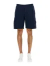 Alexander Mcqueen Men Bermuda Shorts With Selvedge Logo Band In Blue
