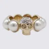 Alexander Mcqueen Ring With Shimmering Crystals In Gold