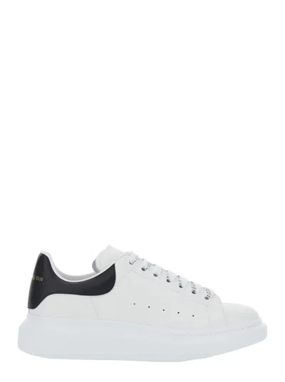 Alexander Mcqueen Black And White Low Top Sneakers With Logo Lettering On Tongue And Contrasting Heel In Leather Man