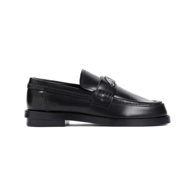 Alexander Mcqueen Seal Logo Plaque Loafers In Black