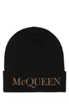 Alexander Mcqueen Embroidered-logo Ribbed Beanie In Black
