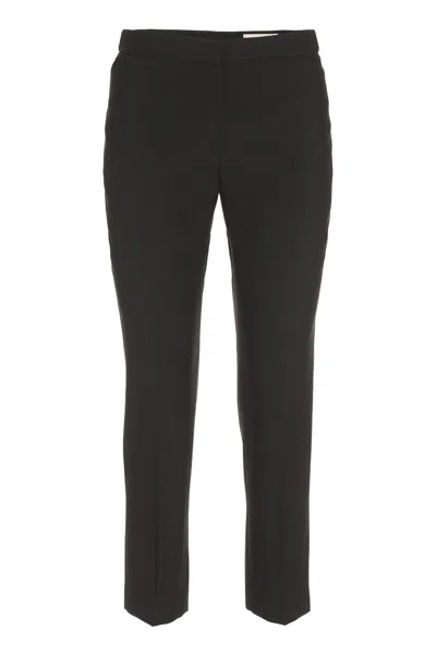 Alexander Mcqueen Black Cropped Wool Tailored Trousers For Women