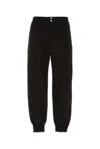Alexander Mcqueen Men Printed Trousers In Black