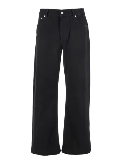 ALEXANDER MCQUEEN BLACK JEANS WITH BELT LOOPS AND LOGO PATCH ON THE REAR IN DENIM MAN