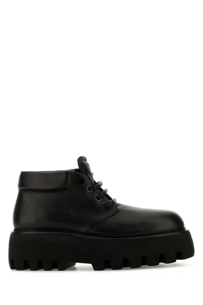 ALEXANDER MCQUEEN BLACK LACE UP BOOTS