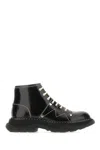 Alexander Mcqueen Contrast Stitching Chunky Outsole Patent Leather Combat Boots In 1090