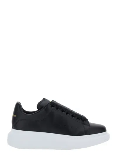 ALEXANDER MCQUEEN BLACK LOW TOP SNEAKERS WITH LOGO LETTERING ON TONGUE AND HEEL IN LEATHER WOMAN