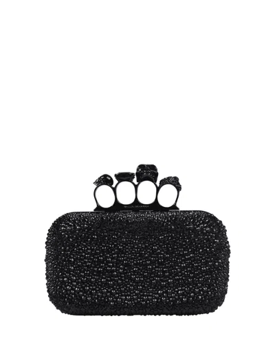 Alexander Mcqueen Black Skull Four Ring Clutch Bag With Chain In Nero