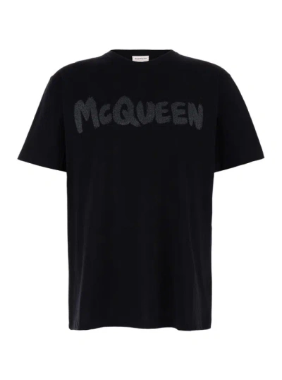 ALEXANDER MCQUEEN BLACK T-SHIRT WITH GLITTER LOGO PRINT IN COTTON