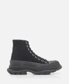 Alexander Mcqueen Leather And Rubber Exaggerated-sole Ankle Boots In Black
