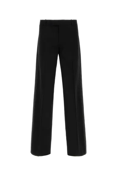 Alexander Mcqueen Wide Leg Wool Trousers With Front And Back Pockets In Black