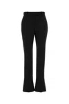 Alexander Mcqueen Tailored Wool Trousers Featuring Flared Hem In Black